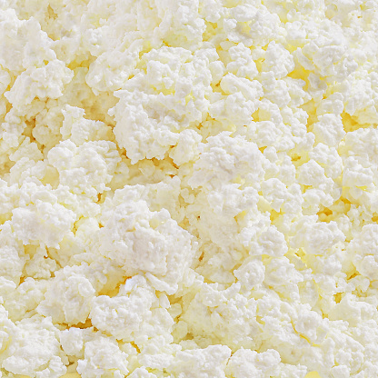 Cottage cheese Pattern. Fresh grainy cottage cheese (curds or whey)  is a curdled milk, diary product. Close up