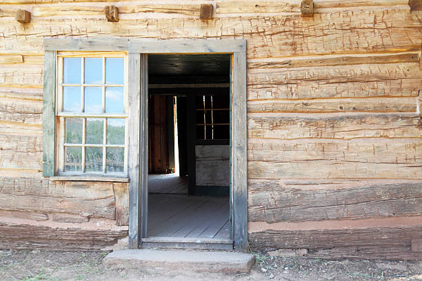 istock historic home facade in Utah with open backdoor 185218318