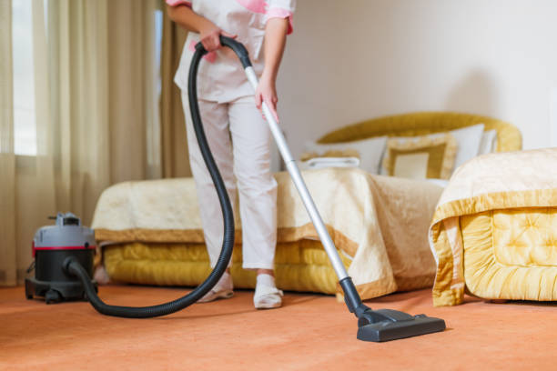 istock Hotel maid   vacuuming  room 1852183601