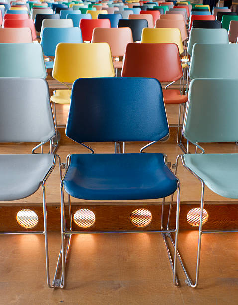 istock colorful empty chairs in theater 185218730