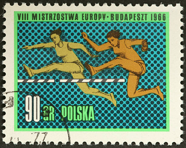 istock women hurdlers on a Polish stamp 185219280
