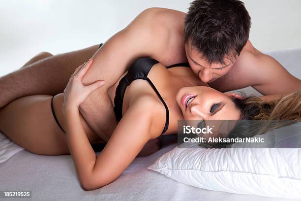 Couple In A Bedroom Stock Photo - Download Image Now - Men, Orgasm, Women