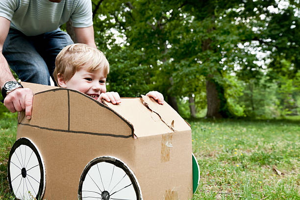 istock Little Boy in a Cardboard Car 185220399