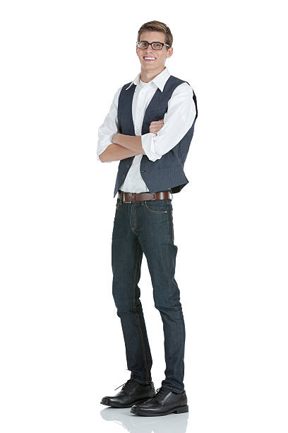 istock Happy man standing with his arms crossed 185220735