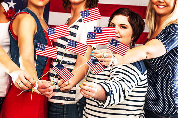 istock Friends in front of the american flag 185220821