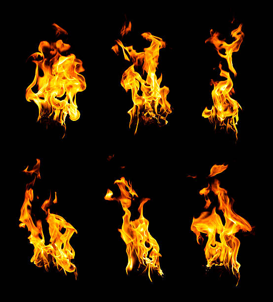 istock Set of burning hot fire flames isolated on black 185220835