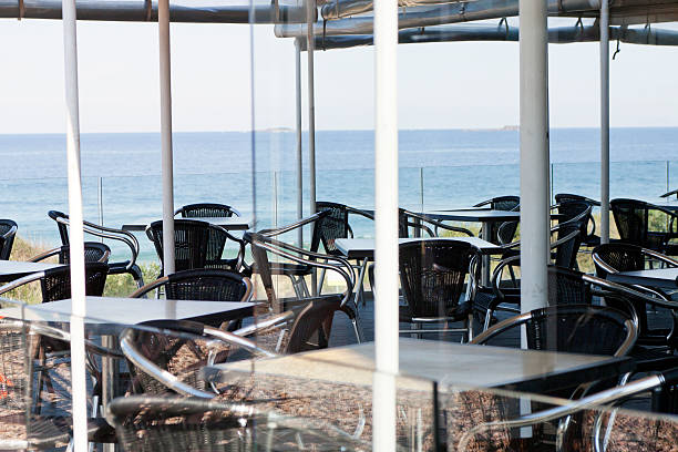 istock Restauran by the sea with aluminium tables and chairs 185221270