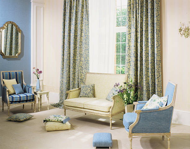 istock Interior of living room with sofa, chairs and curtains 185221724