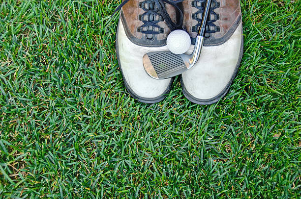 istock Well-worn men's golf shoes 185222130