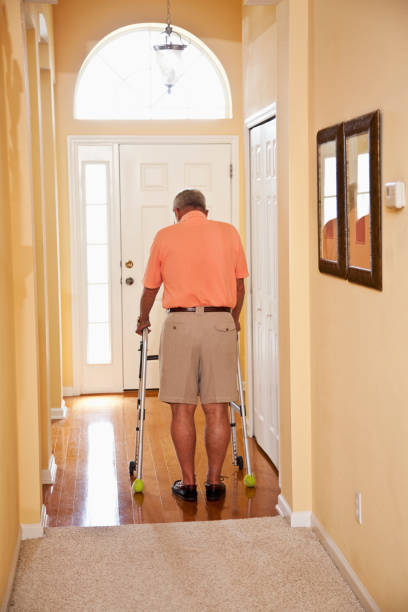 istock Senior man with walker at home 185222709
