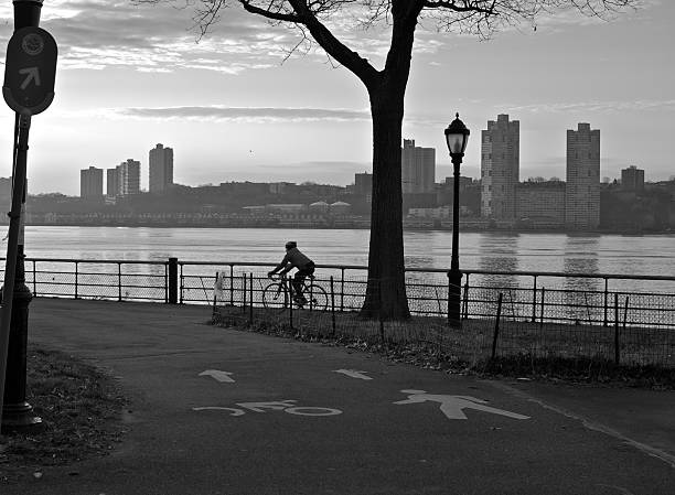 istock Bicyclist at sundown in Riverside Park, Manhattan, NYC 185223151