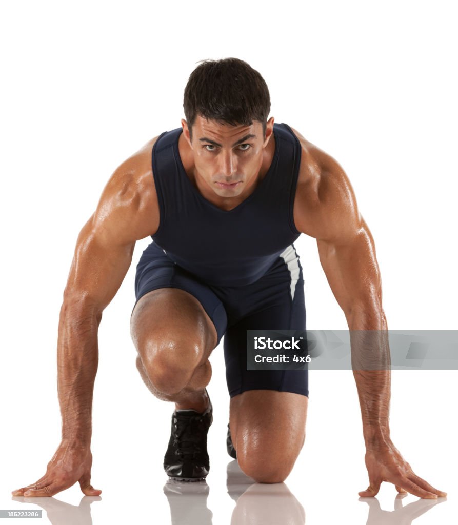 Masculino atleta na linha de partida antes de Corrida - Royalty-free Bloco de Largada Foto de stock