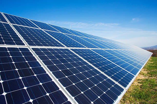 istock Solar panels on a sunny day against clear blue sky 185223584