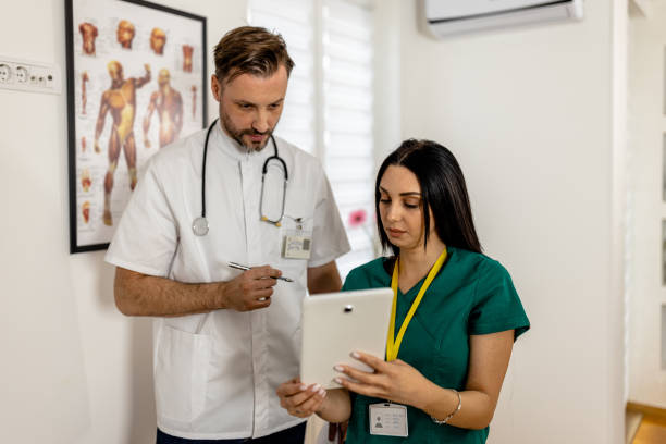 istock Medical Professionals Utilize Digital Tablet for Streamlined Patient Care 1852236984