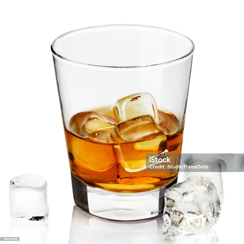 whisky on rock glass of whisky on rock isolated on white background.. Alcohol - Drink Stock Photo