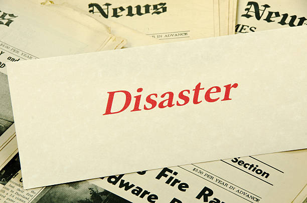istock Disaster on News Papers Close-up 185224004