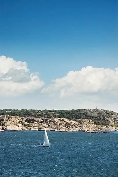 Photo of Sailing by the coast