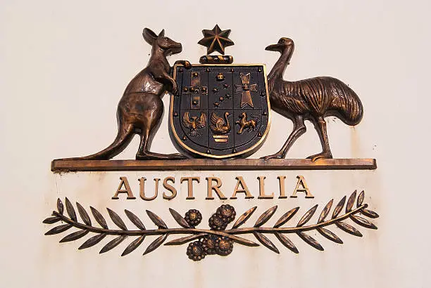 "The Coat of Arms of Australia, seen on a beige pillar at the Old Parliament House in capital Canberra."