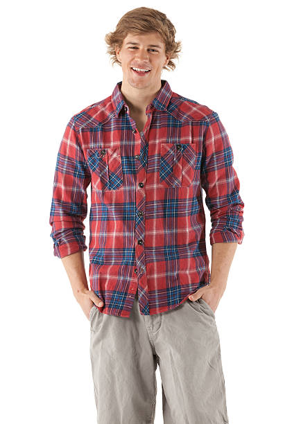 istock Happy man standing with hands in pockets 185225121