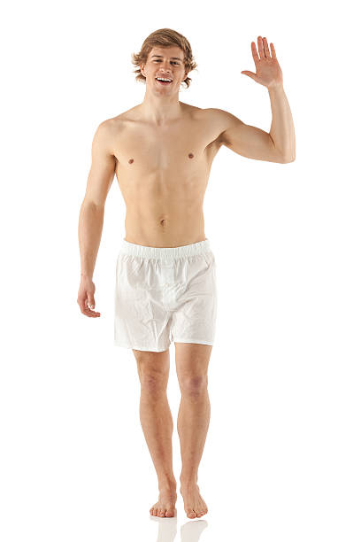 Bare chested man walking and waving hand Bare chested man walking and waving handhttp://www.twodozendesign.info/i/1.png man muscular chest stock pictures, royalty-free photos & images