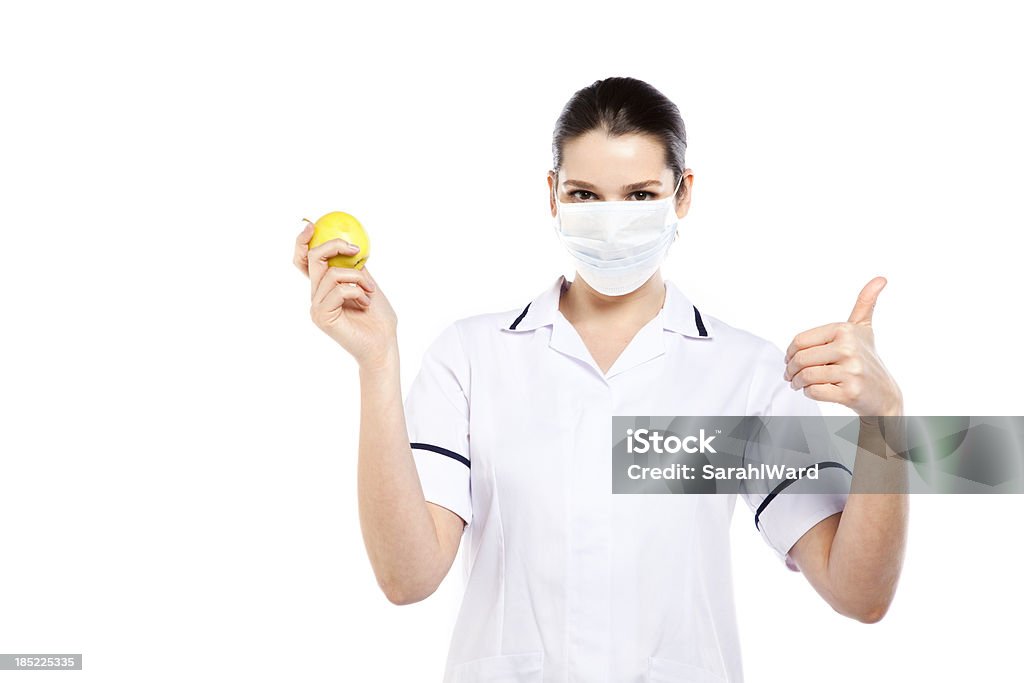 Feminino médico com máscara facial - Foto de stock de Dentista royalty-free