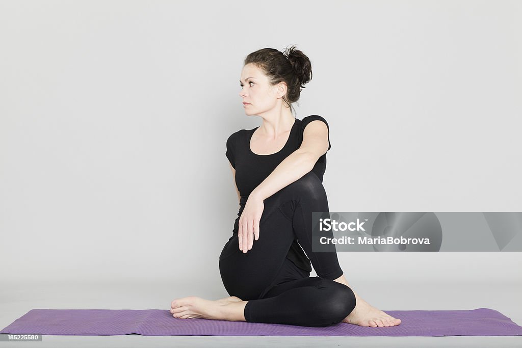 fitness Active woman doing her exercise indoor. 30-34 Years Stock Photo