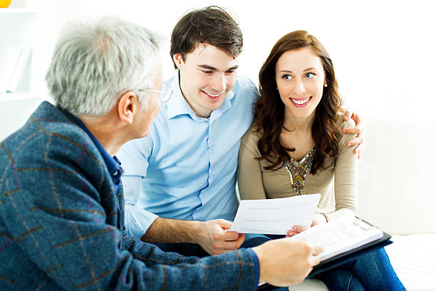 istock Couple Meeting With Financial Advisor 185225982