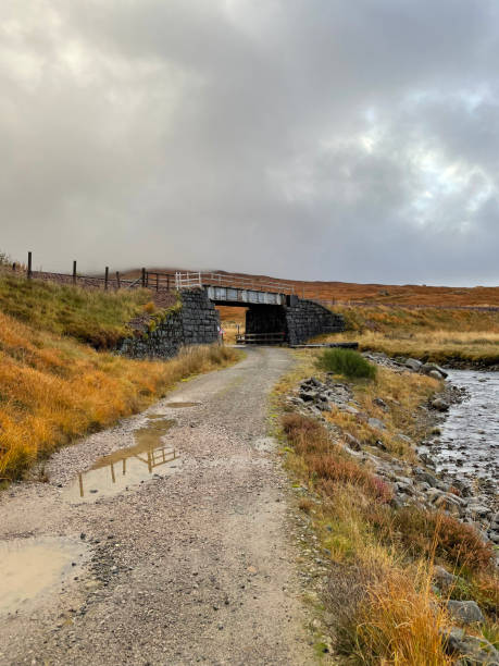 istock Dirt track under a railway bridge in the remote Scottish Highlands 1852259826