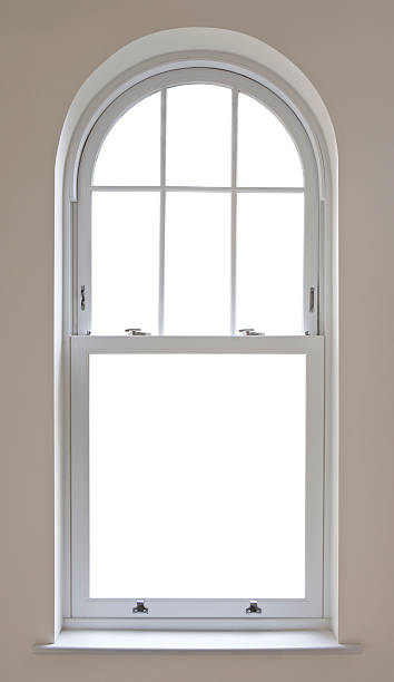 beautiful arched window with clipping path "a beautifully made arched sash window from a luxury house, finished in white. Modern chrome window locks have been fitted whilst the  window frame is set in a caramel coloured wall. Two paths have been included: A Clipping path for the window panes (to enable you to place a background image of your choice) and a path around the arch and sill, to enable a change of wall colour.Looking for a window Please see my window collection including cut-outs with clipping paths by clicking on the Lightbox Link below..." window latch stock pictures, royalty-free photos & images