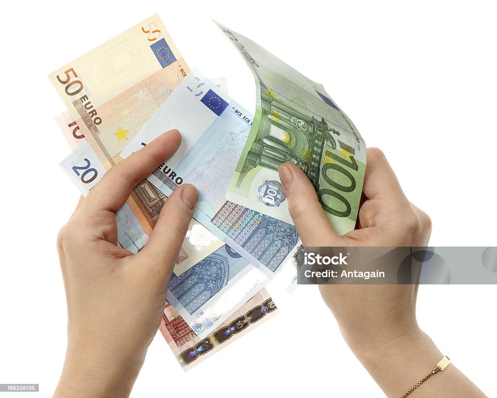 Mains avec Euro - Photo de Acheter libre de droits