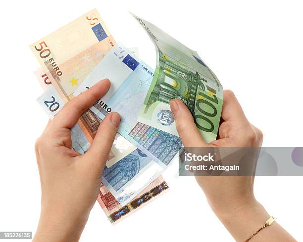 Foto de Mãos Com Euro e mais fotos de stock de Comprar - Comprar, Dar, Dedo humano