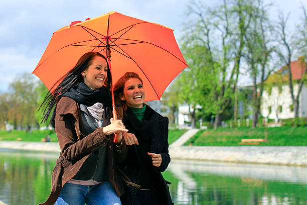 istock Best friends laughing on their walk in the park 185226247
