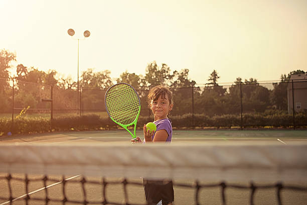 istock little girl tennis player 185226684