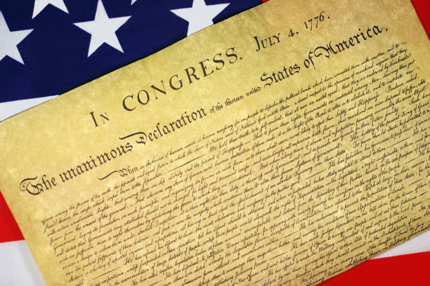 istock Declaration of Independence with US Flag Background 185227226