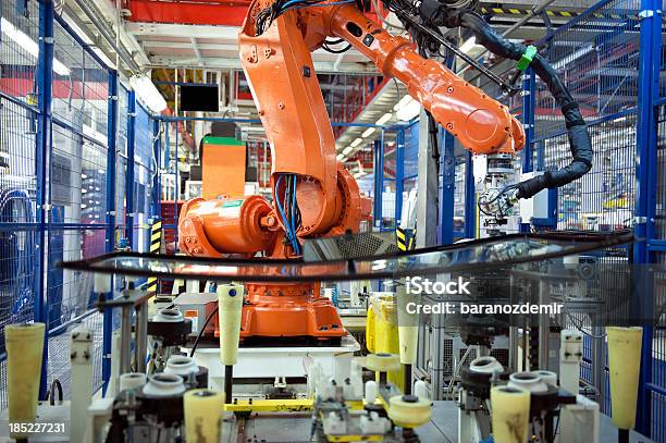 Robotic Arm Auto Manufacturing Stock Photo - Download Image Now - Factory, Glass - Material, Machinery