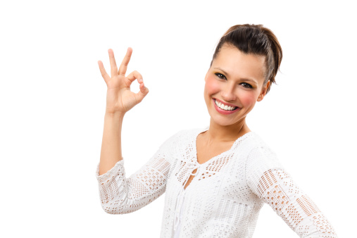 Beautiful woman showing an OK sign