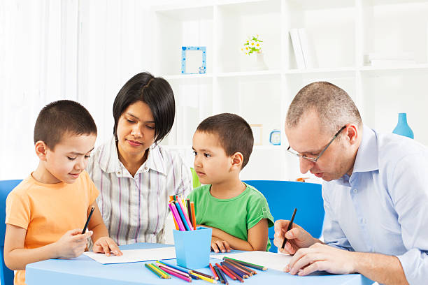 istock Diverse family Having Fun coloring and drawing. 185227504