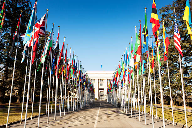 istock flag draped roadway behind United nations building 185227613