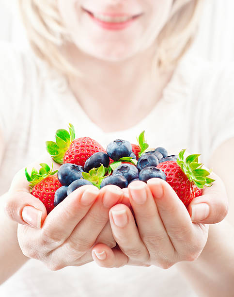 istock Handful of fresh fruits 185228571