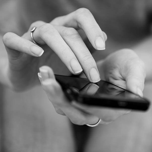 Young Woman Using A Smart Phone stock photo