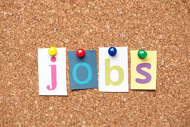 istock Jobs letters on corkboard 185229317