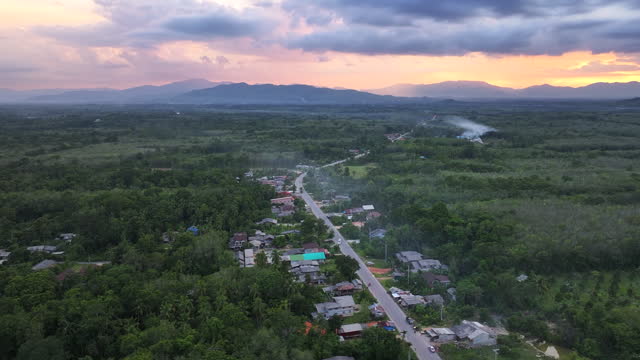 Aerial Drone Sunset Scene Road and Country side in Yala Province, South of Thailand