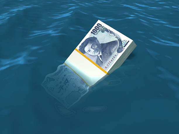 istock Money sinking in water 185229668