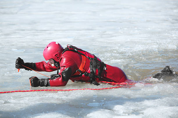Ice water rescuer stock photo