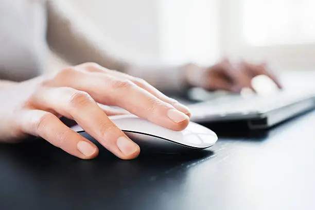 Photo of Hand with Computer Mouse