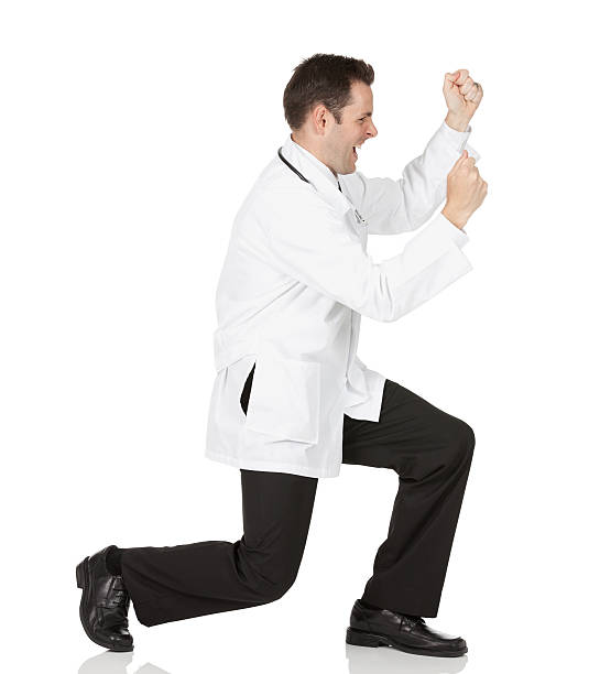 istock Male doctor celebrating his success 185230397