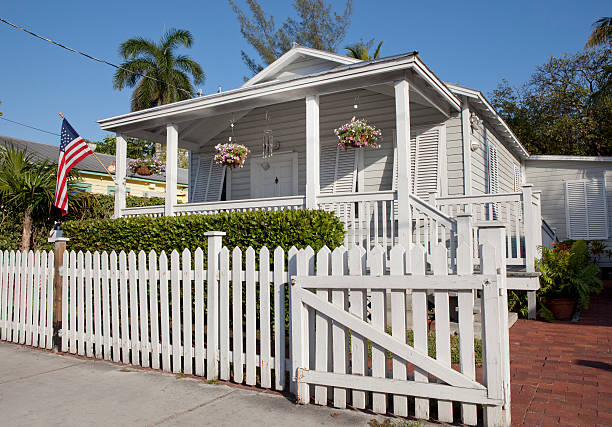 Key West Florida Architecture Key West Florida Architecture showing small white house with white picket fence small florida home stock pictures, royalty-free photos & images