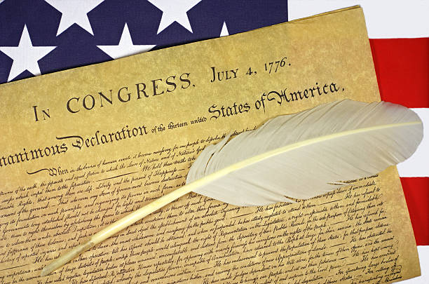 istock Declaration of Independence with US Flag and Quill Pen 185230889