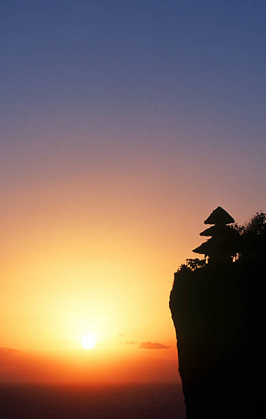 istock Indonesia, Bali, Bukit Peninsula, Uluwatu cliff temple, sunset. 185230968