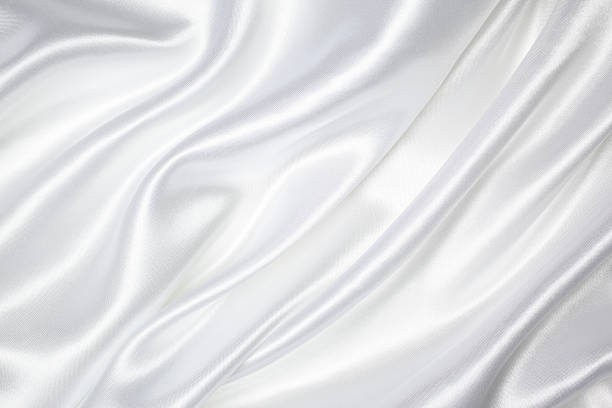 White Silk Texture White color silk texture background. silk stock pictures, royalty-free photos & images